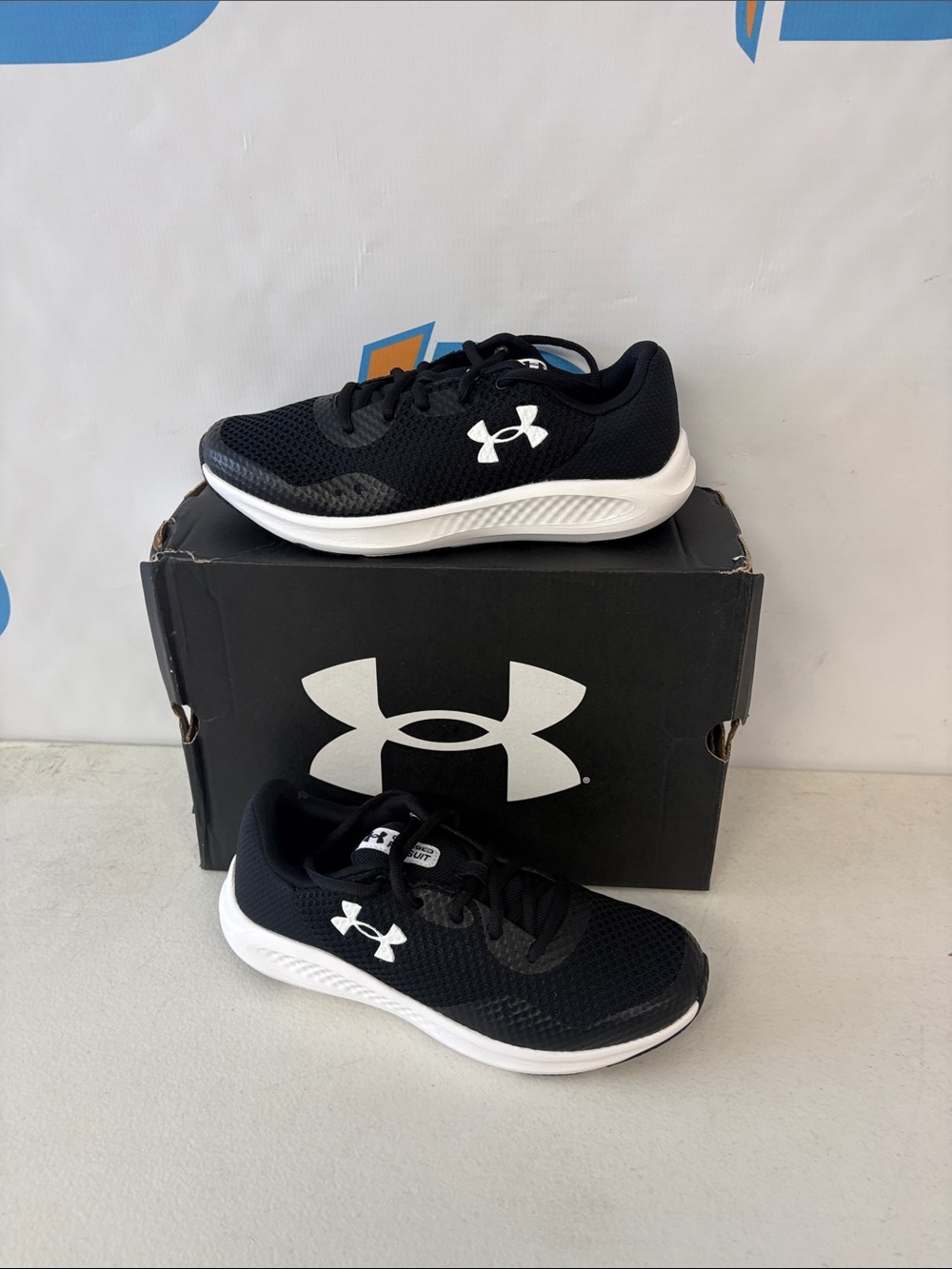 Under Armour Kids Black and White Athletic Sneakers